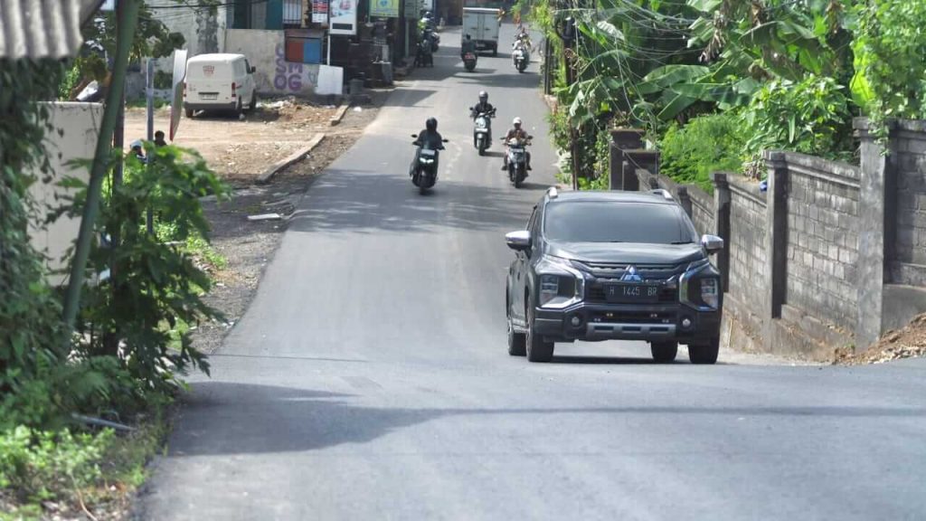 Kondisi Jalan Toyaning Ungasan setelah proses pengaspalan.